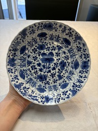 Seven Chinese blue and white plates with floral design, Kangxi