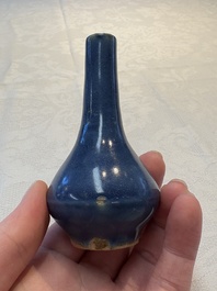 A pair of Chinese powder-blue vases and a blue and white 'Hatcher Cargo' vase, Transitional period