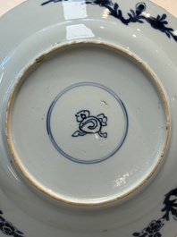 Seven Chinese blue and white plates with floral design, Kangxi