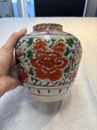 A Chinese wucai jar and cover, a famille verte vase, a dish and three plates, Kangxi
