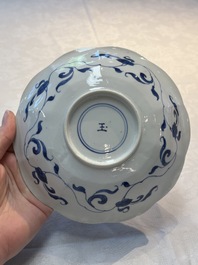 A pair of Chinese blue and white flower-shaped 'Long Eliza' plates, Kangxi