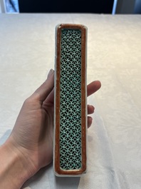 A Chinese iron-red and green-enamelled reticulated incense stick holder, 19th C.