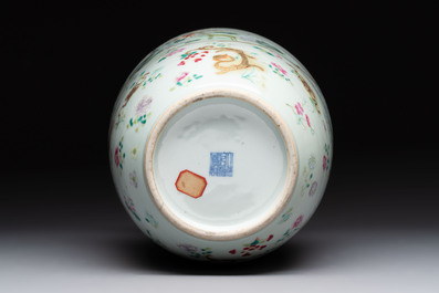 A Chinese famille rose 'immortals' vase on wooden stand and a plaque, Qianlong mark, 20th C.