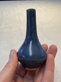 A pair of Chinese powder-blue vases and a blue and white 'Hatcher Cargo' vase, Transitional period