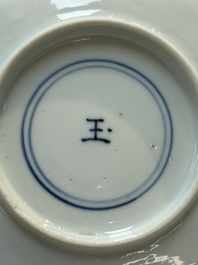 A pair of Chinese blue and white flower-shaped 'Long Eliza' plates, Kangxi