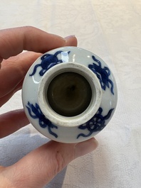 A pair of Chinese blue and white 'Long Eliza' miniature vases and wooden covers, Kangxi