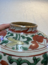 A Chinese wucai jar and cover, a famille verte vase, a dish and three plates, Kangxi