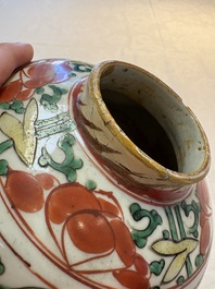 A Chinese wucai jar and cover, a famille verte vase, a dish and three plates, Kangxi