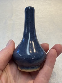 A pair of Chinese powder-blue vases and a blue and white 'Hatcher Cargo' vase, Transitional period