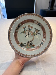 A Chinese wucai jar and cover, a famille verte vase, a dish and three plates, Kangxi