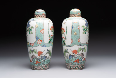 A pair of famille verte-style ovoid jars and covers, Samson, Paris, 19th C.