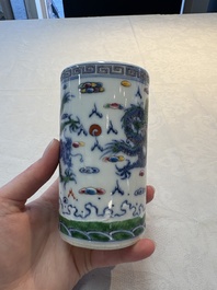 A pair of Chinese famille rose 'crane' cups and a 'dragon' brush pot, Guangxu mark, 20th C.