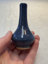 A pair of Chinese powder-blue vases and a blue and white 'Hatcher Cargo' vase, Transitional period