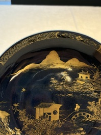 A Chinese gilt-decorated powder-blue plate and a famille verte plate with flowers, Kangxi/Qianlong