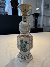 A Chinese wucai jar and cover, a famille verte vase, a dish and three plates, Kangxi