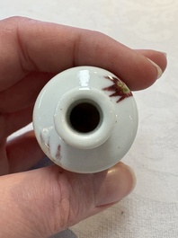 A Chinese copper-red and white 'bamboo' snuff bottle, Qianlong mark, 19th C.