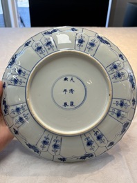 Seven Chinese blue and white plates with floral design, Kangxi