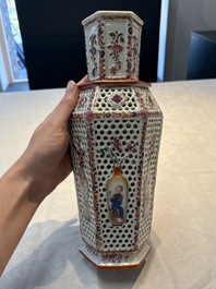 A pair of Chinese famille rose reticulated double-walled 'mandarin subject' vases, Qianlong