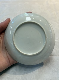 A Chinese Canton famille rose 'mandarin subject' cup and saucer, Qianlong