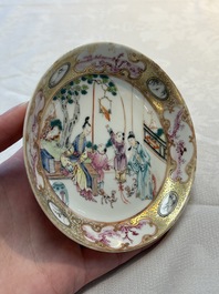 A Chinese Canton famille rose 'mandarin subject' cup and saucer, Qianlong