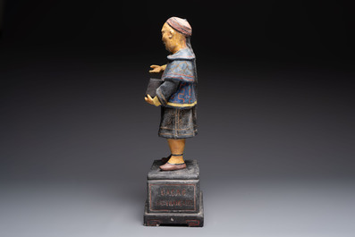 A French papier-m&acirc;ch&eacute; figure of a mandarin, inscribed 'Compagnie Fran&ccedil;aise Des Chocolats et Des Th&eacute;s', 20th C.