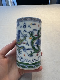 A pair of Chinese famille rose 'crane' cups and a 'dragon' brush pot, Guangxu mark, 20th C.