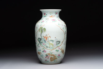 A Chinese famille rose 'immortals' vase on wooden stand and a plaque, Qianlong mark, 20th C.