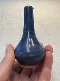 A pair of Chinese powder-blue vases and a blue and white 'Hatcher Cargo' vase, Transitional period
