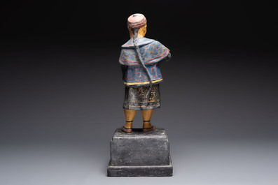 A French papier-m&acirc;ch&eacute; figure of a mandarin, inscribed 'Compagnie Fran&ccedil;aise Des Chocolats et Des Th&eacute;s', 20th C.