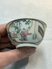 A Chinese Canton famille rose 'mandarin subject' cup and saucer, Qianlong