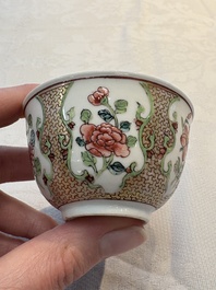 A fine Chinese gilt-decorated famille rose cup and saucer with floral design, Yongzheng