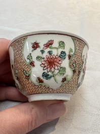 A fine Chinese gilt-decorated famille rose cup and saucer with floral design, Yongzheng