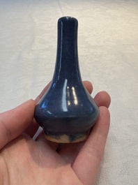 A pair of Chinese powder-blue vases and a blue and white 'Hatcher Cargo' vase, Transitional period