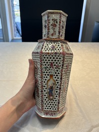 A pair of Chinese famille rose reticulated double-walled 'mandarin subject' vases, Qianlong