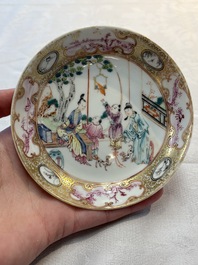 A Chinese Canton famille rose 'mandarin subject' cup and saucer, Qianlong