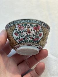 A fine Chinese gilt-decorated famille rose 'flower basket' cup and saucer, Yongzheng