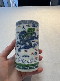 A pair of Chinese famille rose 'crane' cups and a 'dragon' brush pot, Guangxu mark, 20th C.