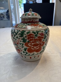 A Chinese wucai jar and cover, a famille verte vase, a dish and three plates, Kangxi