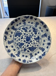 Seven Chinese blue and white plates with floral design, Kangxi