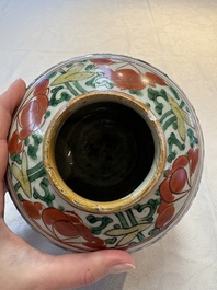 A Chinese wucai jar and cover, a famille verte vase, a dish and three plates, Kangxi
