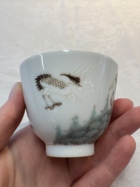 A pair of Chinese famille rose 'crane' cups and a 'dragon' brush pot, Guangxu mark, 20th C.