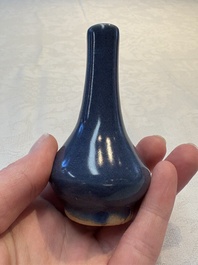 A pair of Chinese powder-blue vases and a blue and white 'Hatcher Cargo' vase, Transitional period