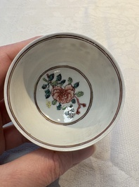A fine Chinese gilt-decorated famille rose cup and saucer with floral design, Yongzheng
