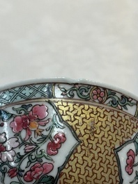 A fine Chinese gilt-decorated famille rose 'flower basket' cup and saucer, Yongzheng