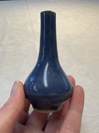 A pair of Chinese powder-blue vases and a blue and white 'Hatcher Cargo' vase, Transitional period