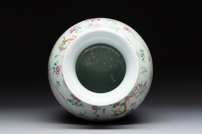 A Chinese famille rose 'immortals' vase on wooden stand and a plaque, Qianlong mark, 20th C.