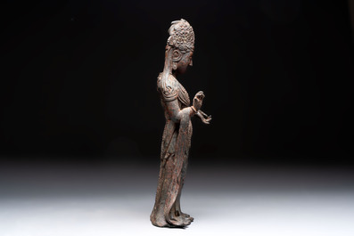 A fine and large Chinese bronze standing Buddha, Liao/Jin