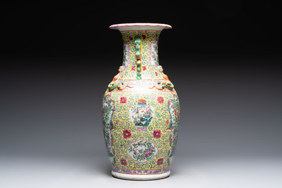 A Chinese famille rose vase and two Canton famille rose vases, 19/20th C.