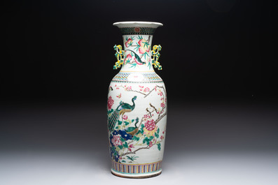 A Chinese famille rose vase and two Canton famille rose vases, 19/20th C.