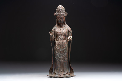 A fine and large Chinese bronze standing Buddha, Liao/Jin